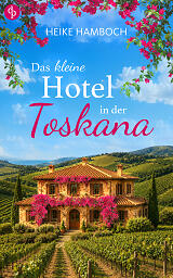 Das kleine Hotel in der Toskana zeigt ein kleines Hotel inmitten grüner Landschaft. Pinke Blumen wachsen um das Haus herum und im Vordergrund sind Weinreben.
